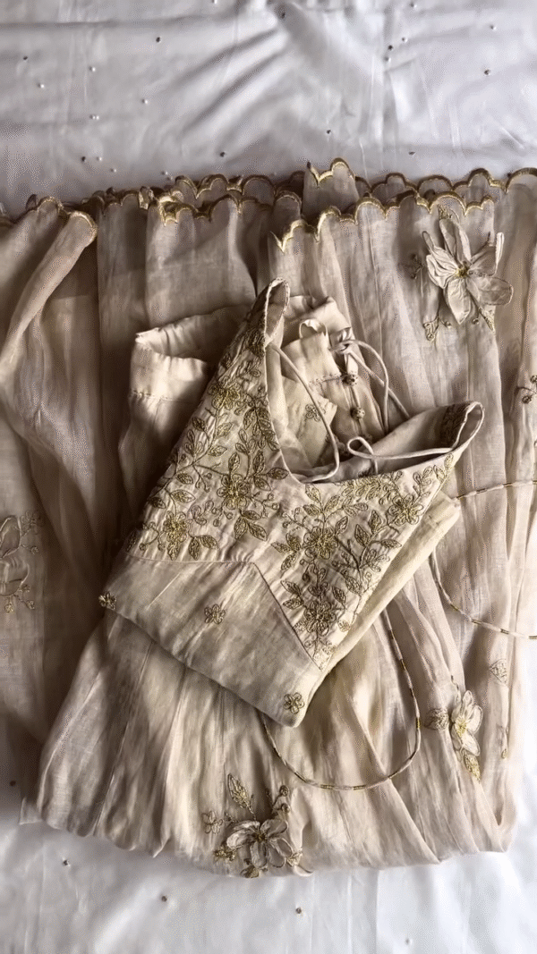 Elegant Ivory Hand-Embroidered Organza Lehenga Set