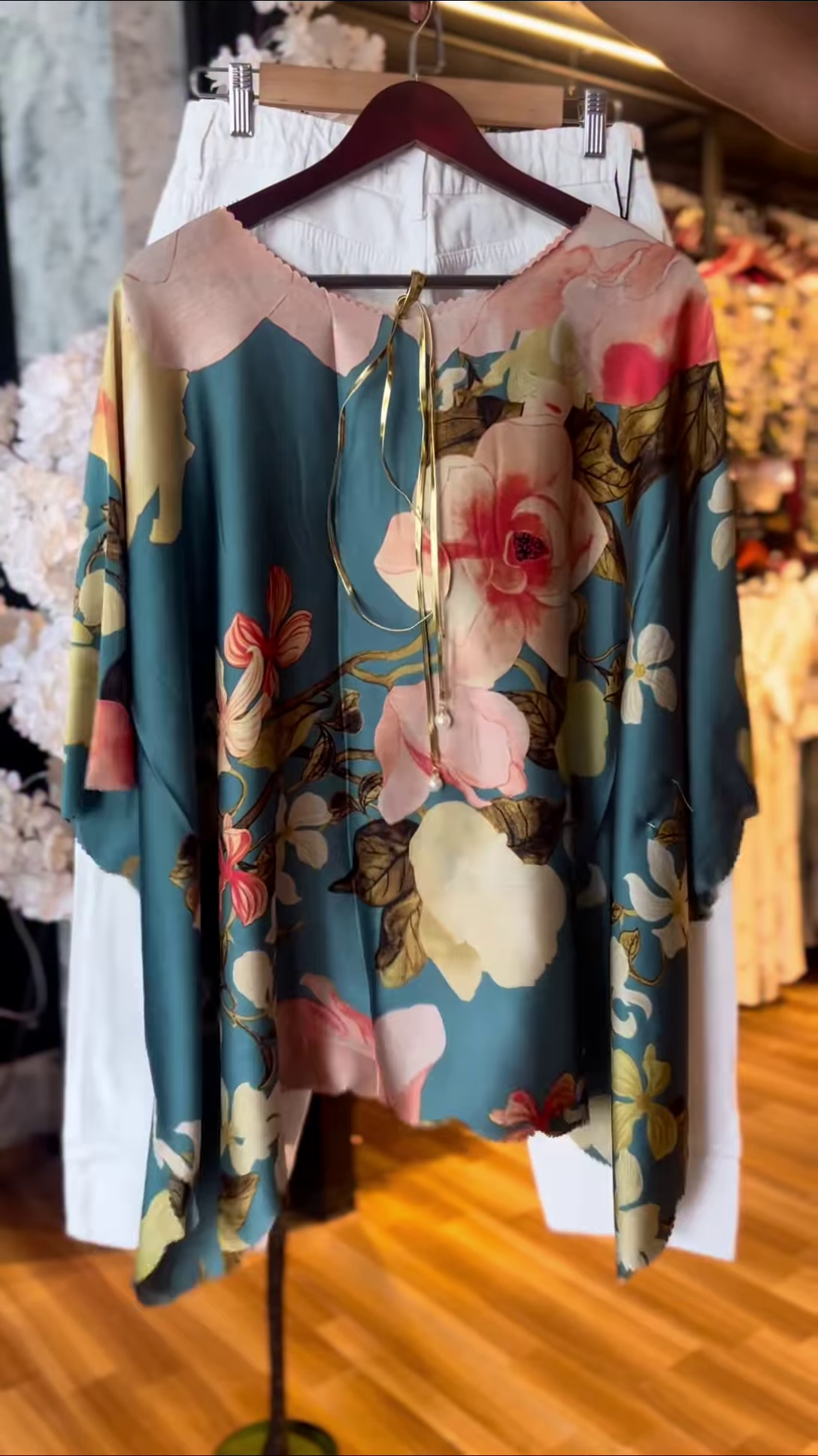 Women’s Teal Floral Tie-Neck Blouse with White Pants – Vibrant Boutique-Style Casualwear