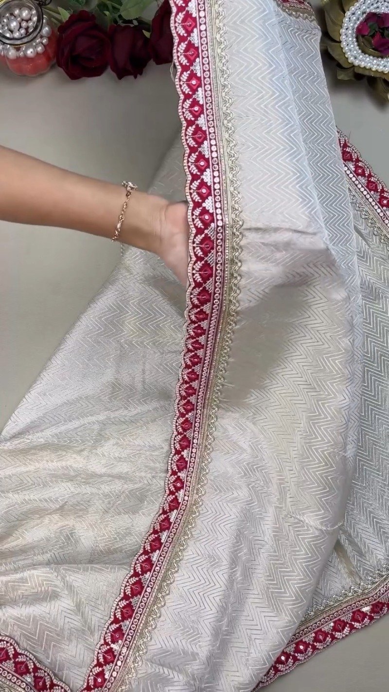 Ivory Chevron Pattern Saree with Embellished Deep Magenta Blouse – Elegant Festive Drape - Image 5