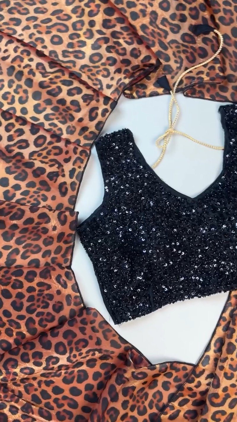 Sultry Leopard Print Organza Saree with Embellished Sequin Blouse