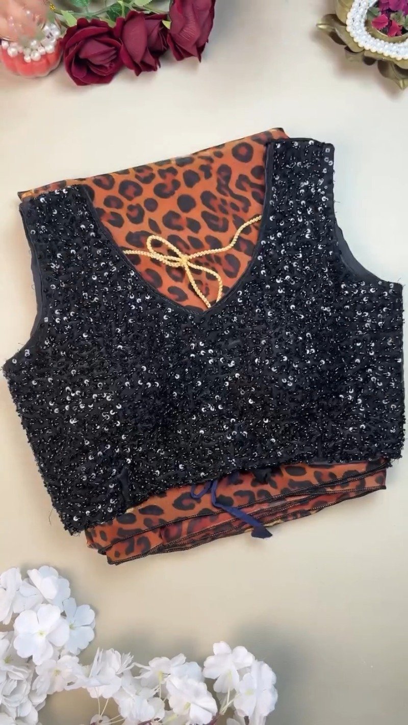 Sultry Leopard Print Organza Saree with Embellished Sequin Blouse - Image 2