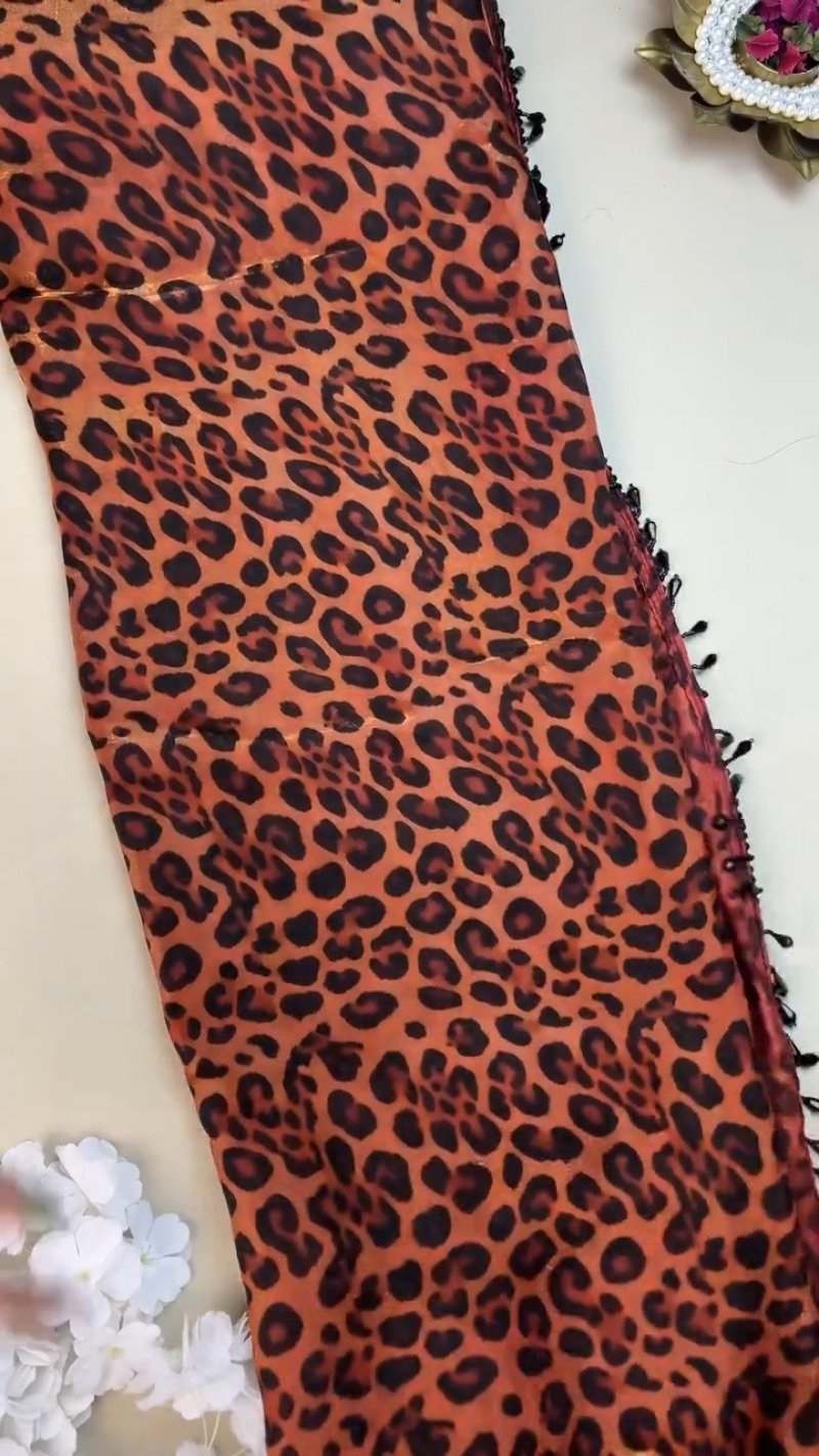 Sultry Leopard Print Organza Saree with Embellished Sequin Blouse - Image 3