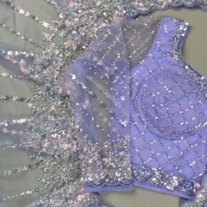 Enchanting Lavender Sequined Net Saree with Intricate Diamond-Grid Blouse